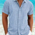 Casual Short-Sleeved Blue Linen Shirt for Men, Featuring an Invisible Button-Up Design, Perfect for Summer Weddings at The Beach.